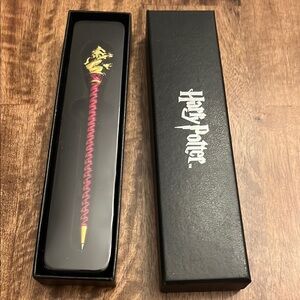 The Noble Collection:  Harry Potter Wand Pen - Gryffindor.